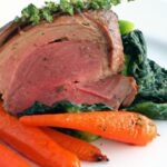 Savor Herb-Crusted Roast Beef Paired with Roasted Carrots