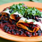 Hearty Black Bean & Spinach Enchiladas in Zesty Red Sauce