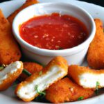 Crispy Homemade Mozzarella Sticks with Tangy Marinara Dip