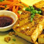 Golden Crispy Tofu Drizzled with Sweet Peanut Sauce Bliss