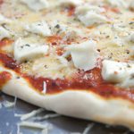 The Art and Flavor of Pizza Quattro Formaggi Delight